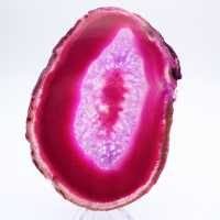 Polierte Scheibe aus gefärbtem rosa Achat