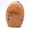 Polierter stein aus orangefarbenem calcit - 0