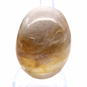 Gelber Quarz-Trommelstein aus Madagaskar mit sanften Konturen