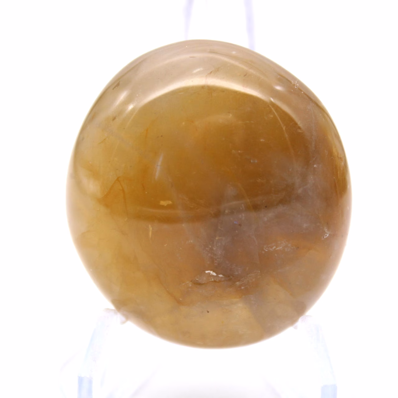 Kleiner gelber madagassischer Quarz-Trommelstein zur Ausstellung